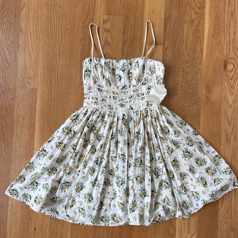 Altar'd State Cream Floral Pleated Fit & Flare
Mini Dress